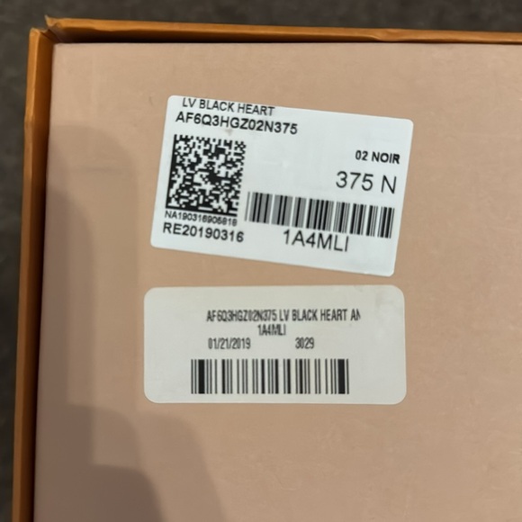 LOUIS VUITTON
Patent Calfskin Monogram LV Black Heart Star Trail Ankle Boots - Picture 8 of 9